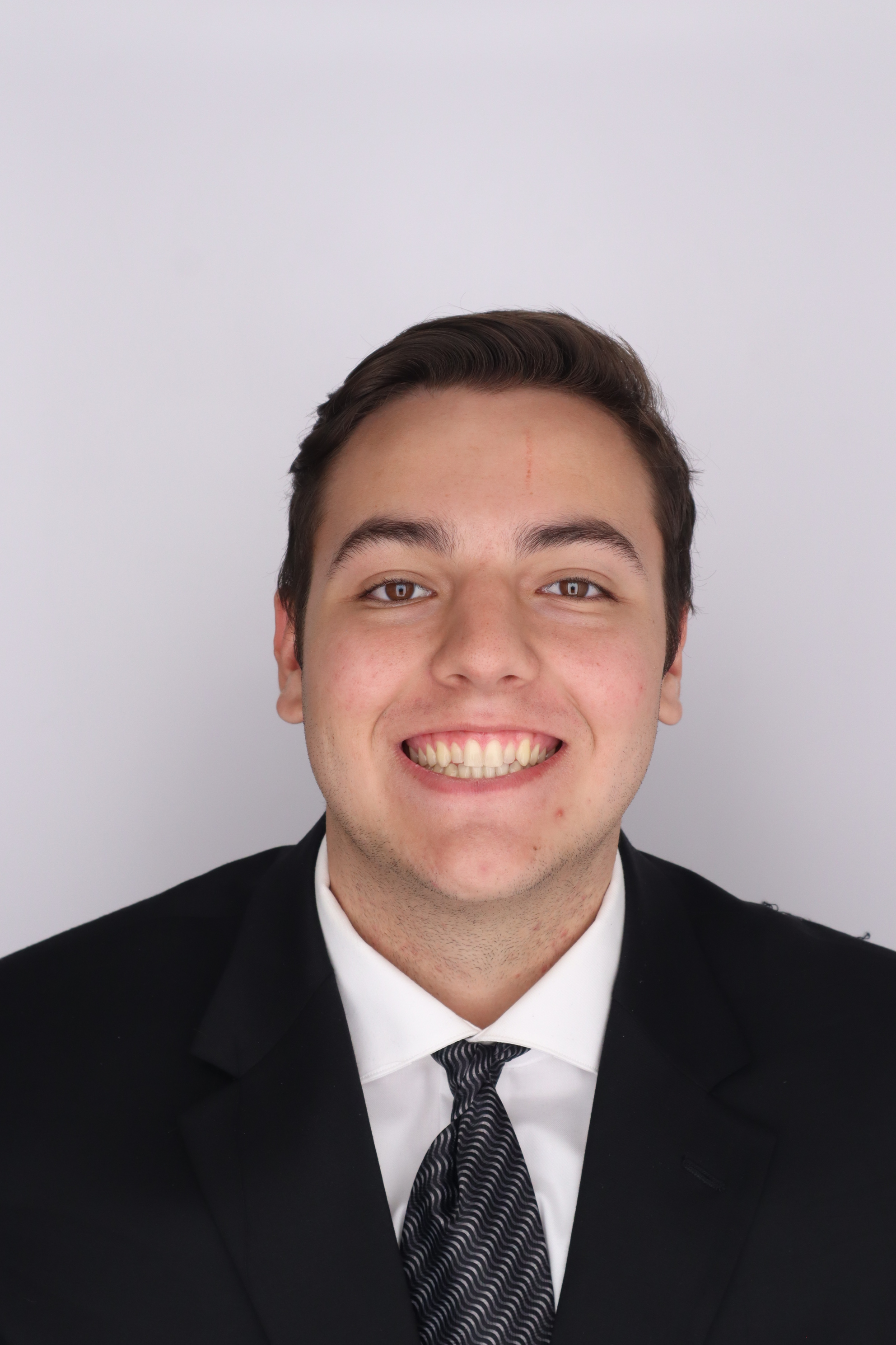 Professional headshot of Brian Bullon